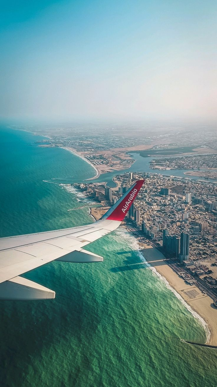 Flying above Sharjah — where the sea meets the city 🌊 _ Air Arabia _ Nikhil Krishna Clicks 📸